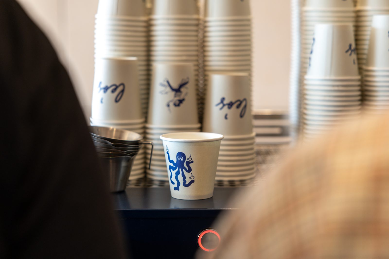 Stacks of Leo's cups at the pass